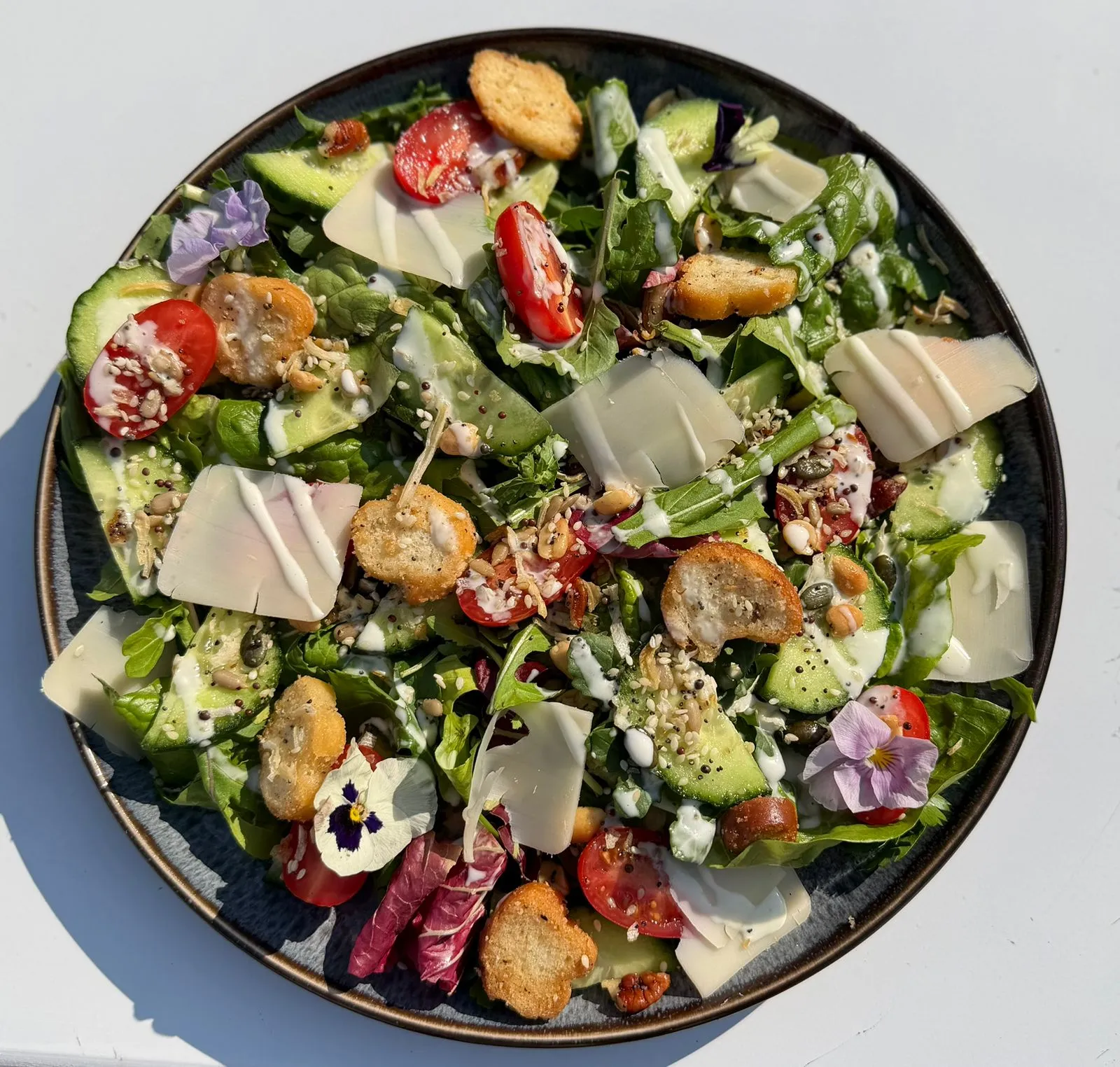 Garden salad with edible flowers